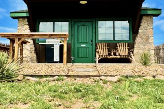 Kokopelli cabin front porch